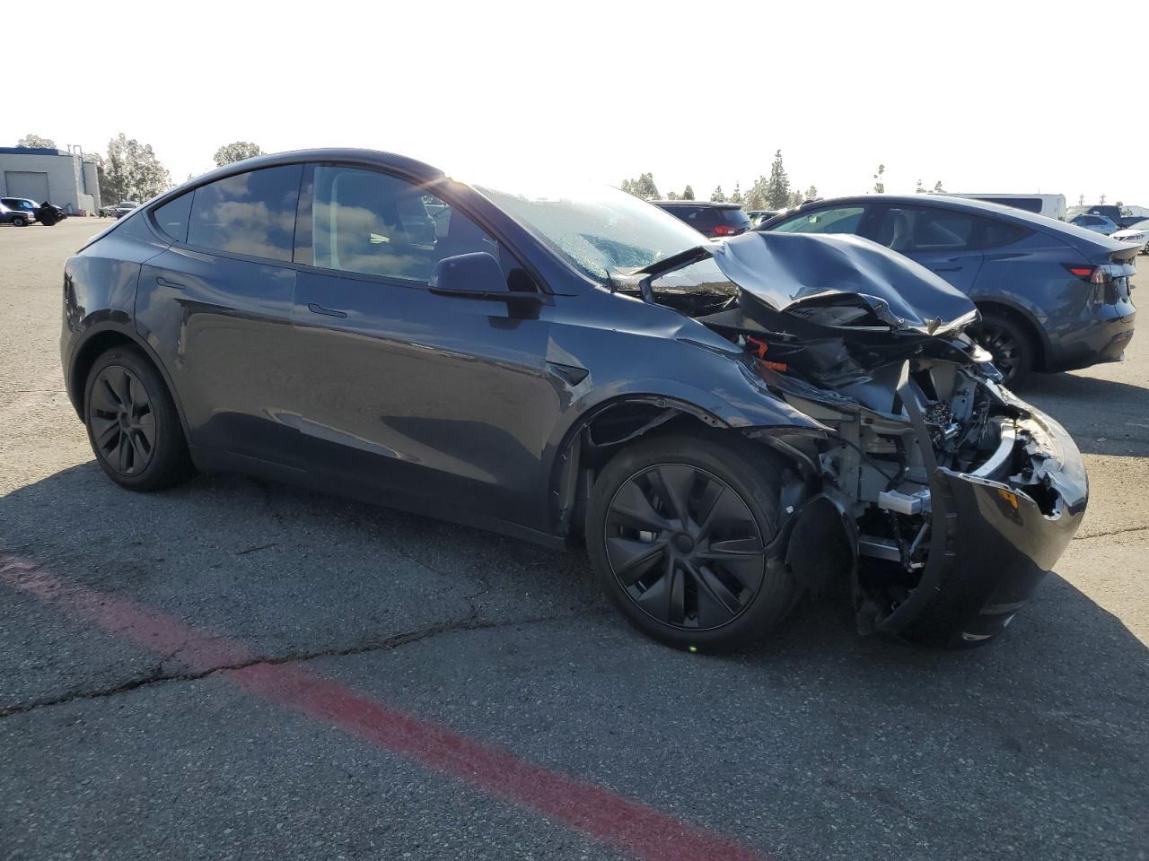 2025 Tesla Model Y Copart, lot number: 50966485, vin: 7SAYGDED4SF242721. Thumbnail 4