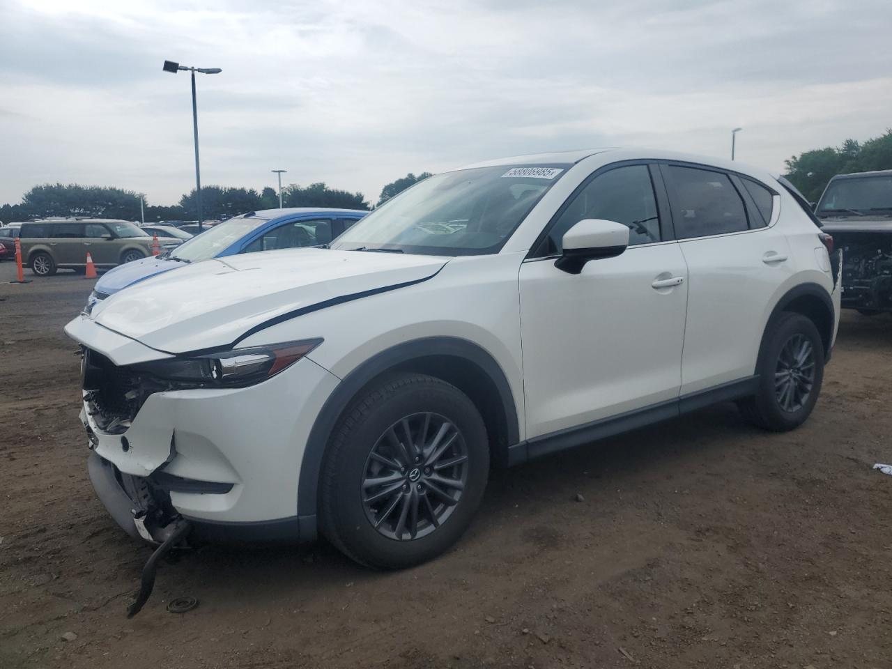 2019 Mazda Cx-5 Touring Copart, lot number: 58806985, vin: JM3KFBCMXK0671817. Thumbnail 1