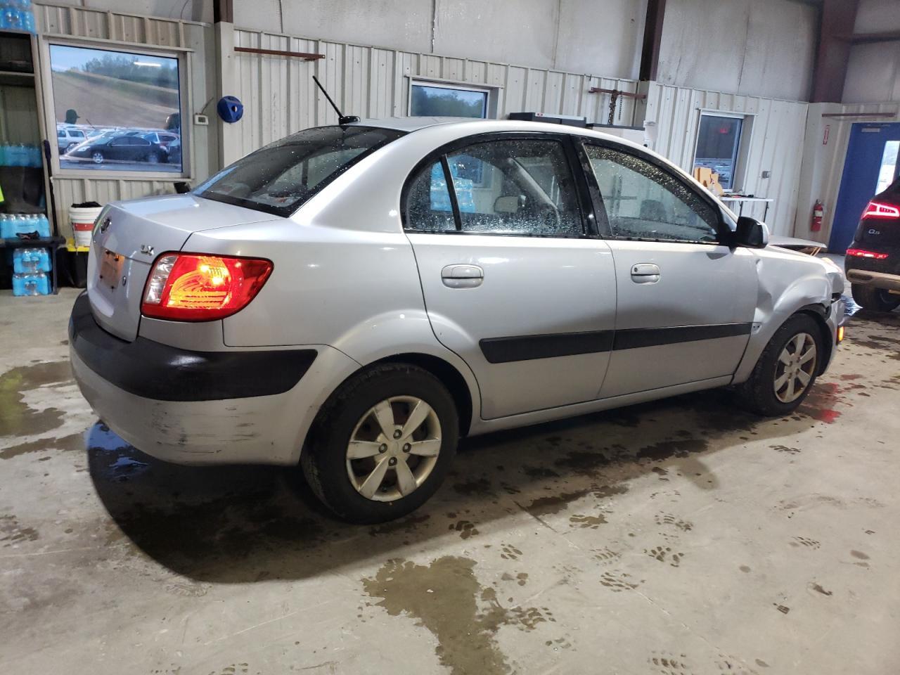 2009 Kia Rio Base Copart, lot number: 56645555, vin: KNADE223596518652. Thumbnail 3