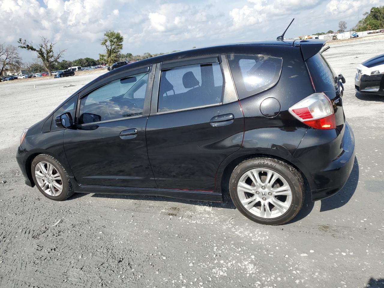 2009 Honda Fit Sport Copart, lot number: 57880705, vin: JHMGE884X9S036607. Thumbnail 2