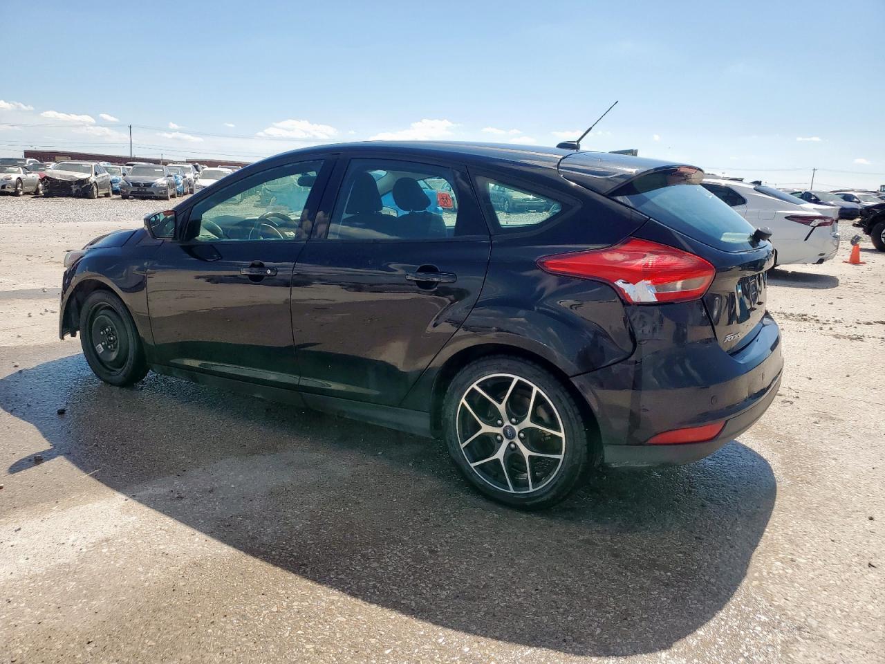 2017 Ford Focus Sel Copart, lot number: 56712805, vin: 1FADP3M20HL340467. Thumbnail 2