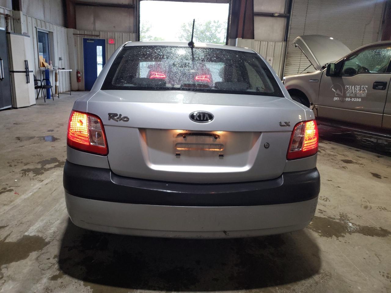 2009 Kia Rio Base Copart, lot number: 56645555, vin: KNADE223596518652. Thumbnail 6