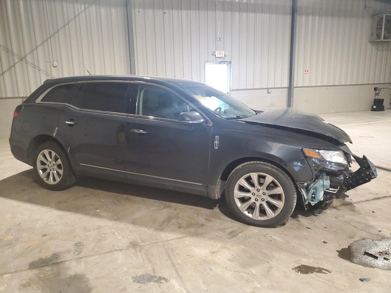 2014 Lincoln Mkt Copart, lot number: 58888805, vin: 2LMHJ5AT6EBL57226. Thumbnail 4