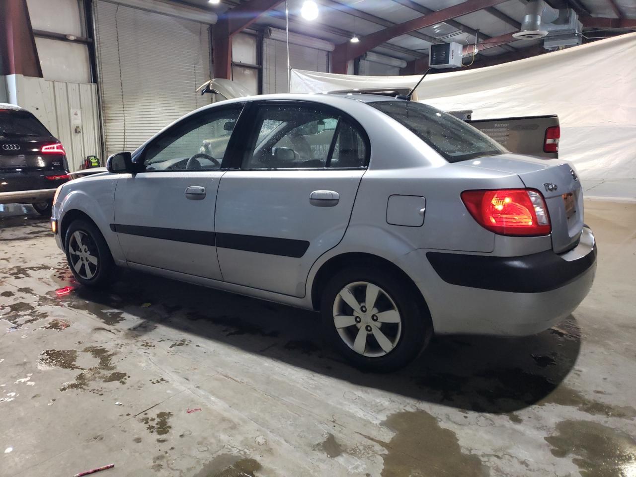 2009 Kia Rio Base Copart, lot number: 56645555, vin: KNADE223596518652. Thumbnail 2