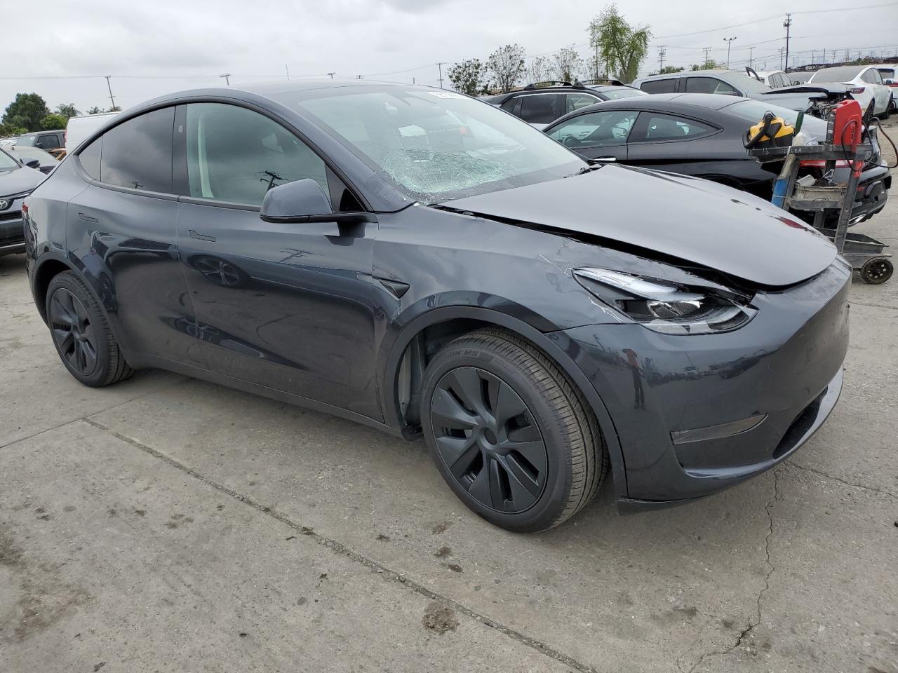 2025 Tesla Model Y Copart, lot number: 56159955, vin: 7SAYGDED4SF242721. Thumbnail 4