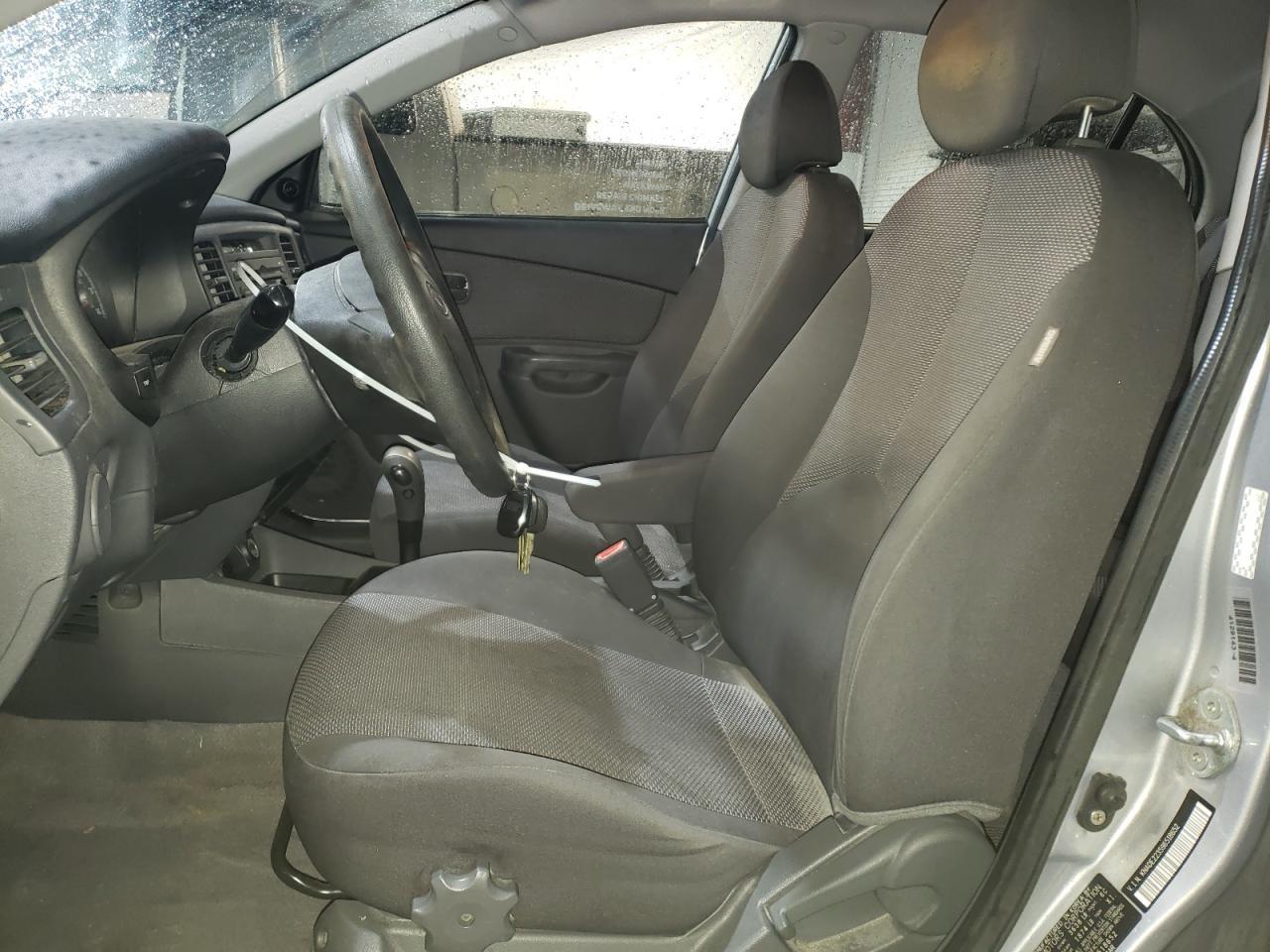 2009 Kia Rio Base Copart, lot number: 56645555, vin: KNADE223596518652. Thumbnail 7