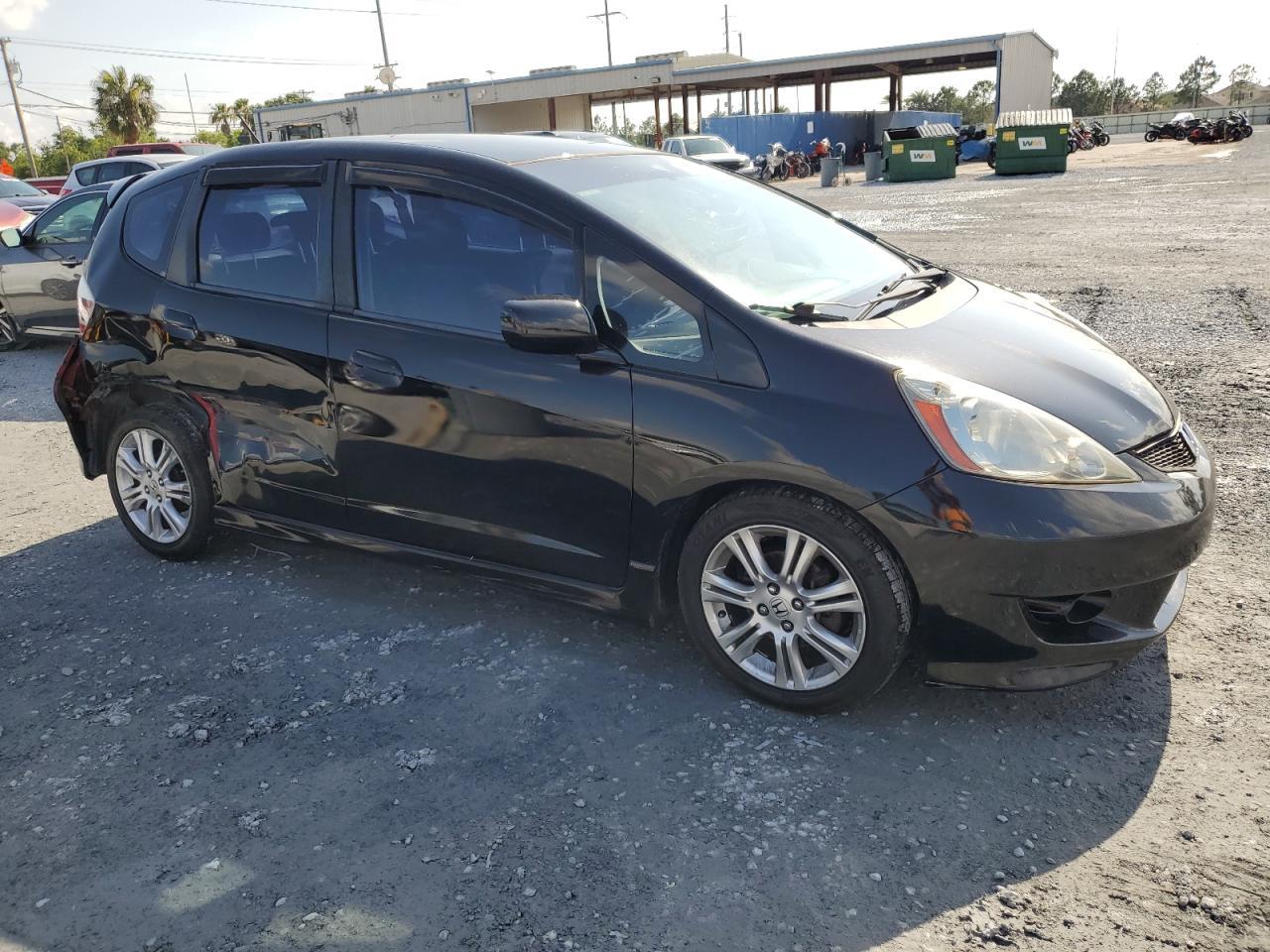 2009 Honda Fit Sport Copart, lot number: 57880705, vin: JHMGE884X9S036607. Thumbnail 4