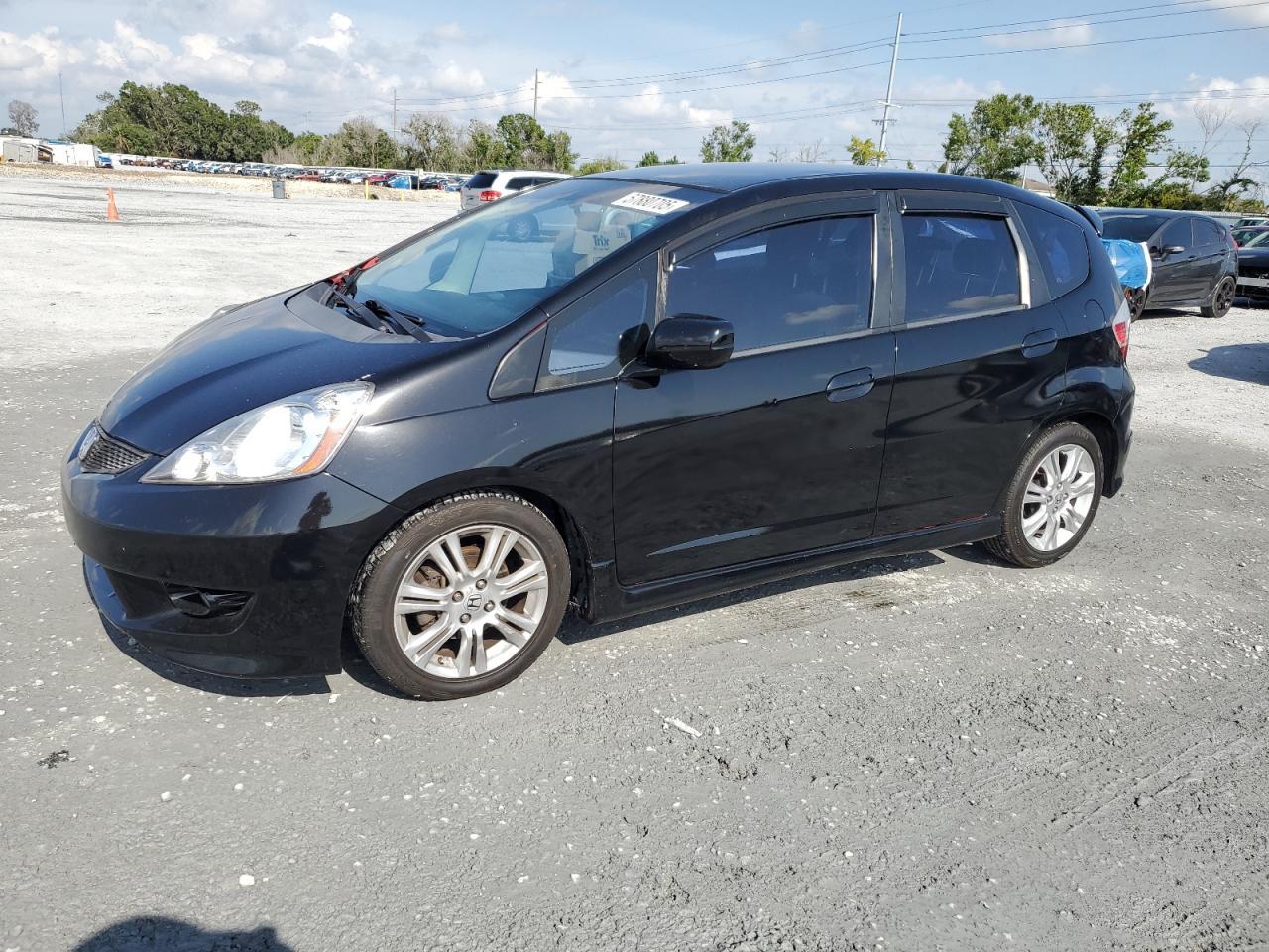 2009 Honda Fit Sport Copart, lot number: 57880705, vin: JHMGE884X9S036607. Thumbnail 1
