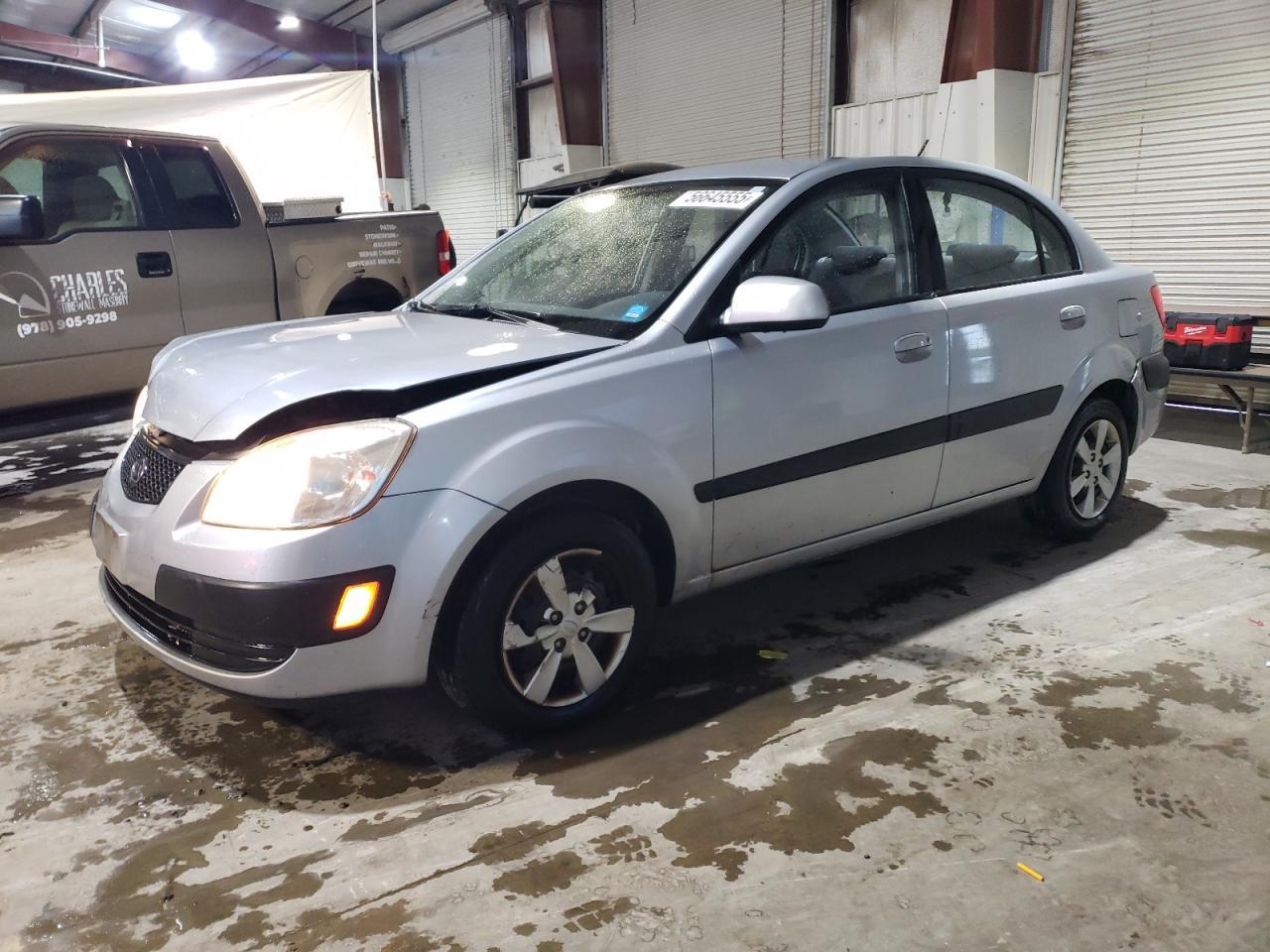 2009 Kia Rio Base Copart, lot number: 56645555, vin: KNADE223596518652. Thumbnail 1