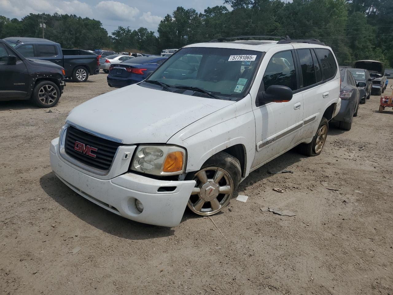 2002 GMC Envoy Copart, lot number: 57791065, vin: 1GKDS13S722214980. Thumbnail 1
