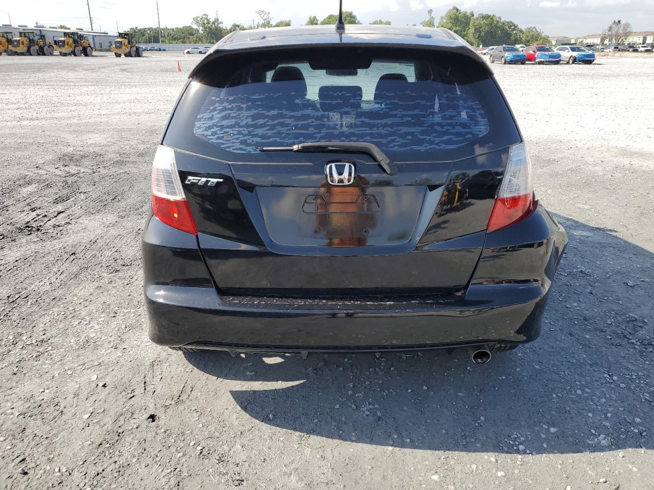 2009 Honda Fit Sport Copart, lot number: 57880705, vin: JHMGE884X9S036607. Thumbnail 6