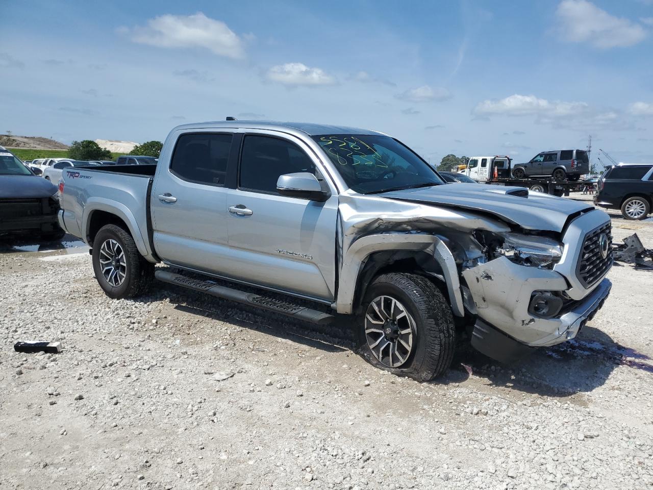 2022 Toyota Tacoma Double Cab Copart, lot number: 55898335, vin: 3TMAZ5CN9NM178766. Thumbnail 4